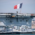 France to isolate 1,900 sailors after virus-hit naval ship docks