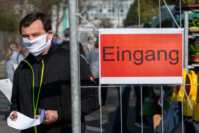 Germany recommends face masks in shops and public transport