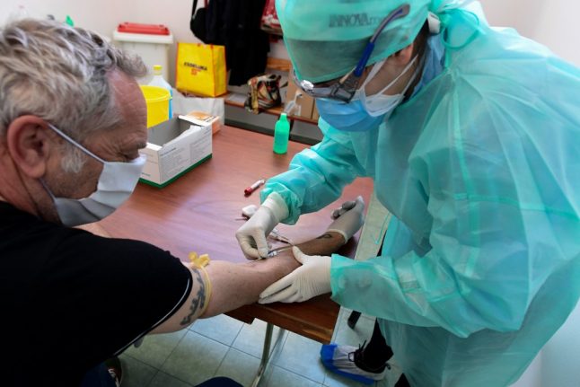 Italian mayor fights lone battle for mass virus blood testing