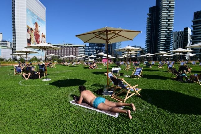 'It's not the seaside, but nearly': Milan residents test out new urban 'beach'