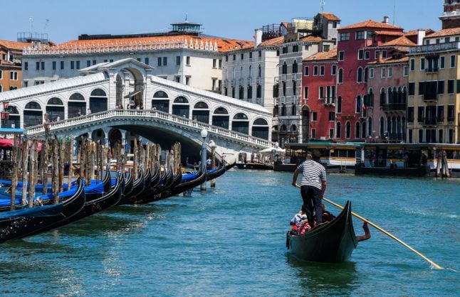 Venice reduces gondola capacity as tourists are 'getting heavier'