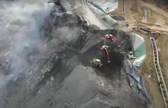 Spanish police arrest owners of rubbish dump where two workers were buried alive by landslide