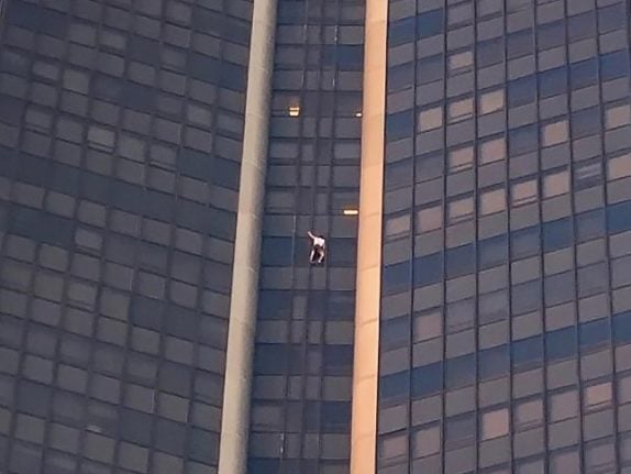 Man arrested after climbing tallest building in Paris