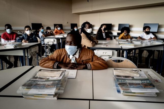 IN PICTURES: French children return to school with masks