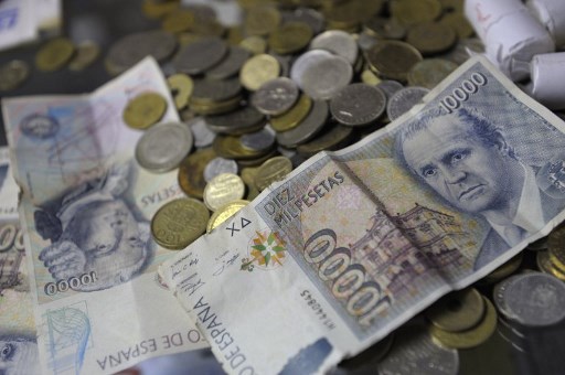 Spaniards urged to dig out their old pesetas and trade them in for euros