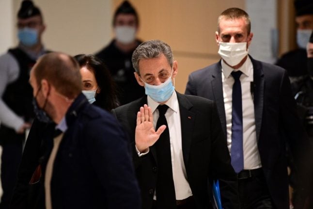 Ex French president Sarkozy takes the stand in his corruption trial