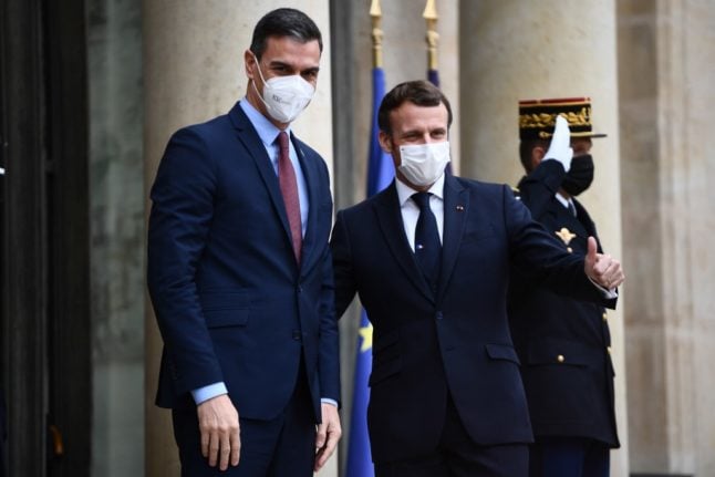Spain's PM in quarantine after Macron tests positive