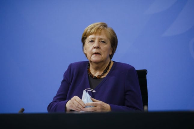 Merkel urges stricter German coronavirus curbs in hotspots