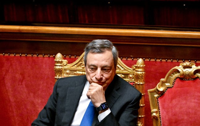 Italy's outgoing Prime Minister Mario Draghi looks on during the government crisis debate at the Senate in Rome on July 20, 2022.