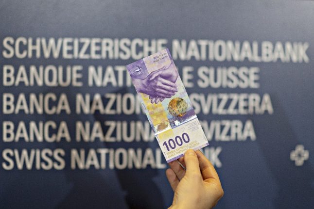 Why is the demand for 1,000-franc banknotes growing in Switzerland?