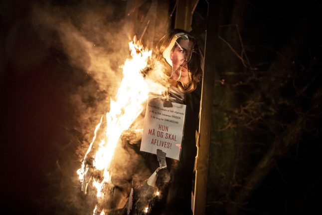 Denmark detains third man over burning of prime minister effigy