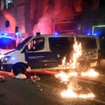 Police van torched in Barcelona protest against rapper’s jailing
