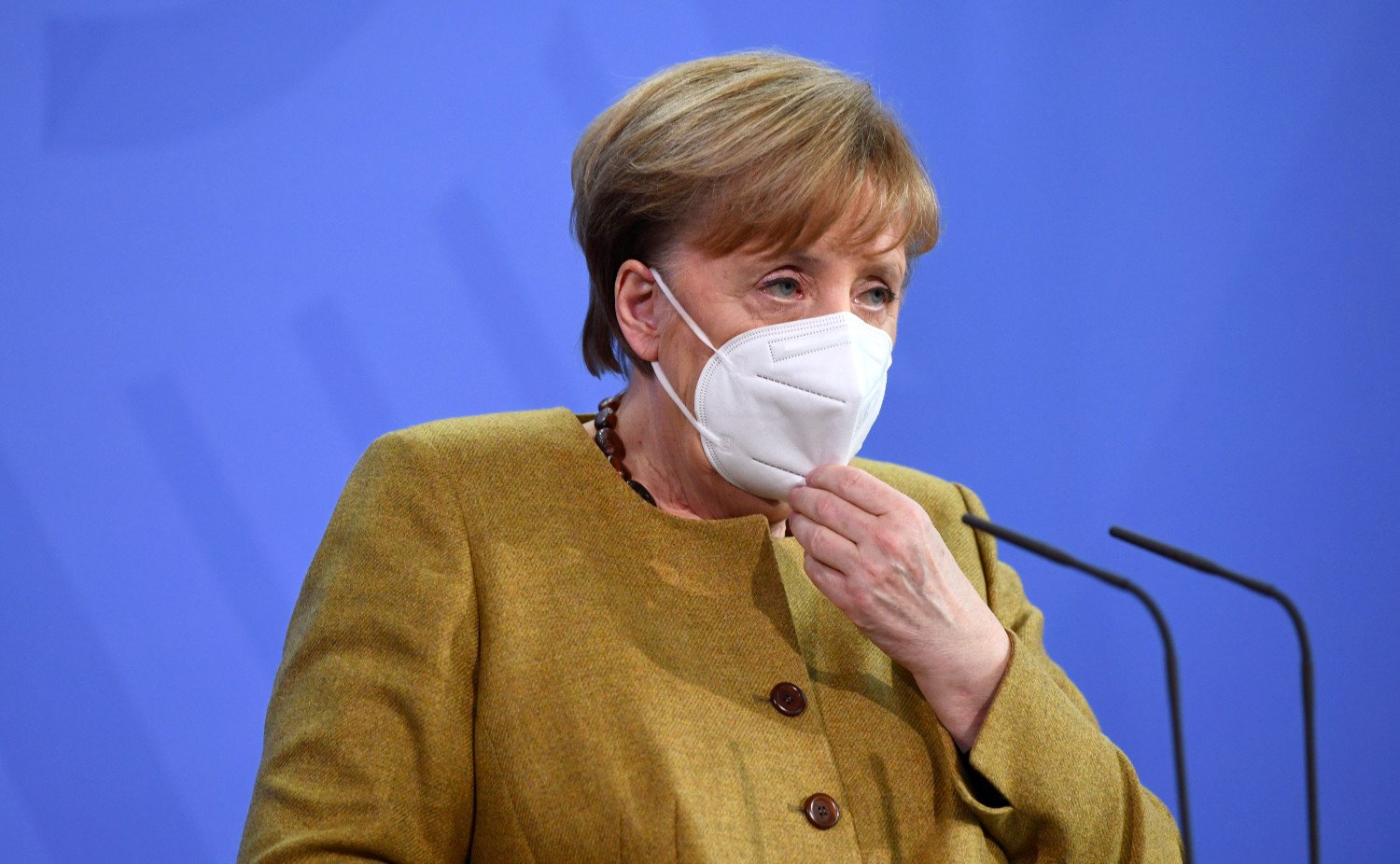Merkel dampens hopes of imminent easing of Covid-19 restrictions