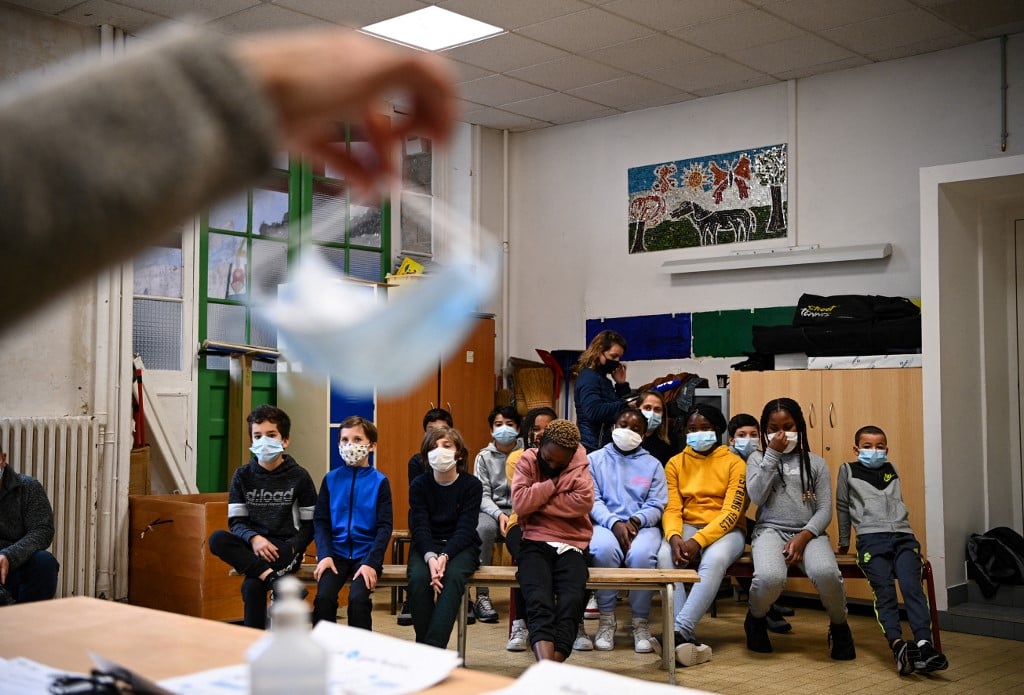 France bans the use of fabric face masks in schools over concerns about efficiency