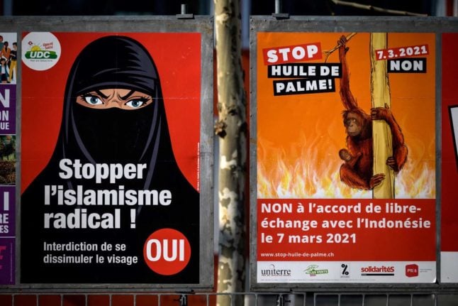 Posters ahead of Switzerland's March 7th referendums in 2021. 