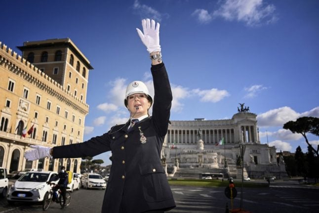 'Like conducting an orchestra': Rome's first female traffic warden on duty in iconic square