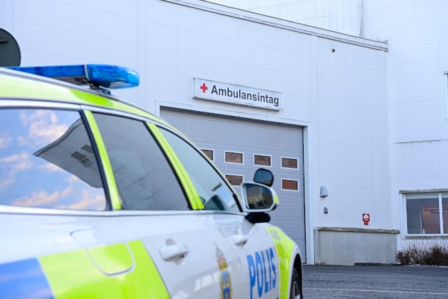 Police outside a hospital where some of the people injured in the Vetlanda attack are being treated