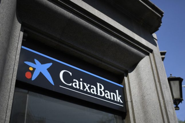 Spain's CaixaBank to axe 8,300 staff and close a quarter of branches