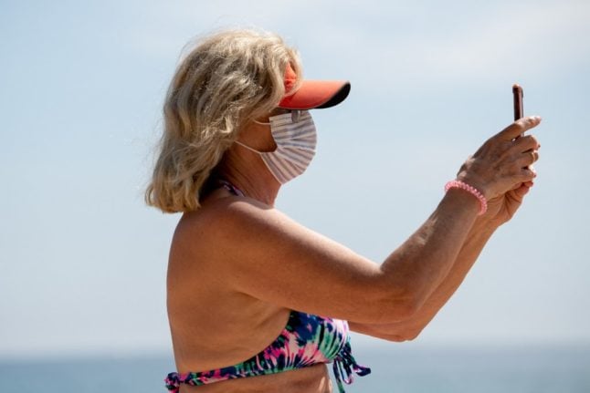 No more weird tan lines: Spain drops sunbathing face mask rule