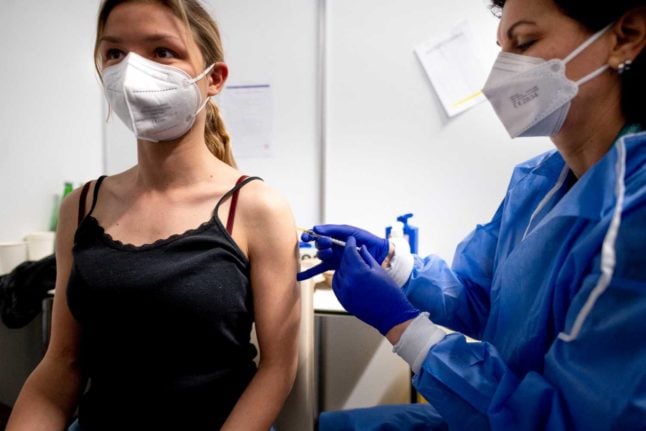Woman being vaccinated