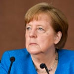 Merkel defends Germany’s new strict Covid measures