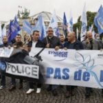 Why are French police demonstrating in Paris?