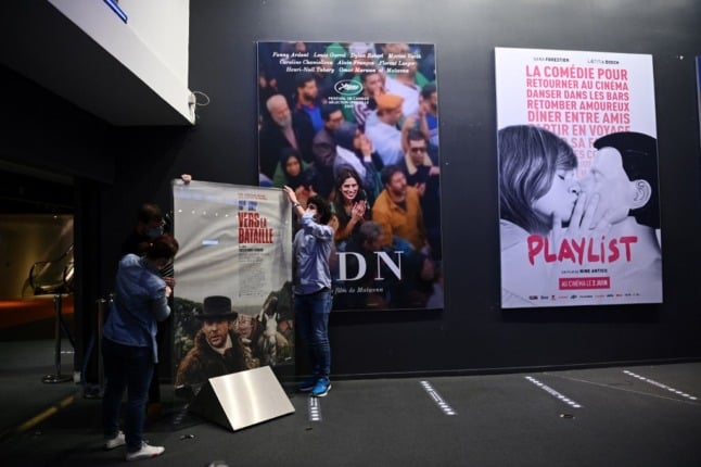 French flock back to cinemas as doors reopen after lockdown