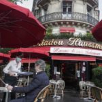 IN PICTURES: The French (and their politicians) head back to café terraces