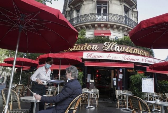 IN PICTURES: The French (and their politicians) head back to café terraces
