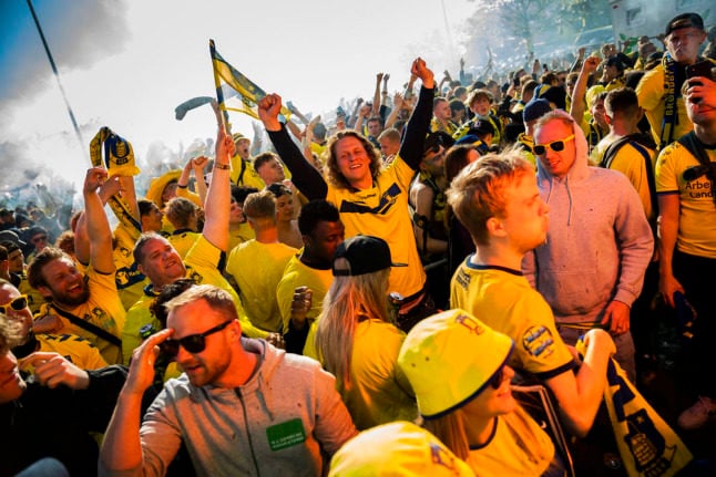 Danish football fans crowd together after rare championship win