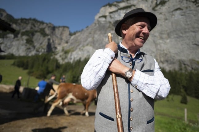 A farmer in Tyrol's Karwendel Alpine nature park near Pertisau, Austria. (Photo by JOE KLAMAR / AFP)