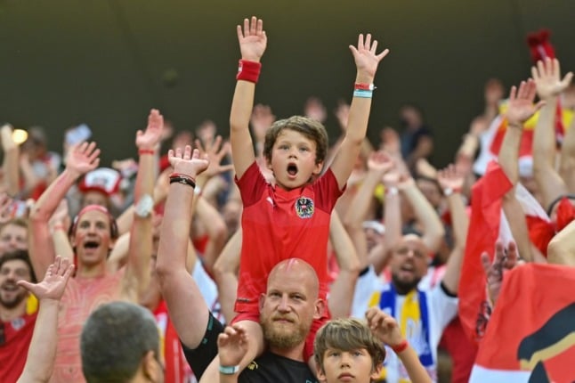 Austria supporters celebrate their team winning the  UEFA EURO 2020 Group C football match between Ukraine and Austria 