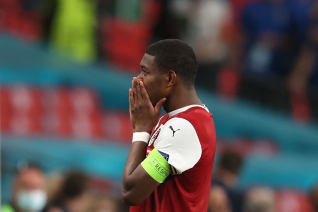 Austria's defender David Alaba reacts after their defeat in UEFA EURO 2020 (Photo by Catherine Ivill / POOL / AFP)