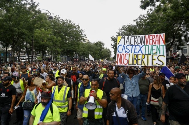 Tens of thousands protest against Macron's health pass in France