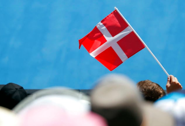 Why do Danes love the Danish flag so much?