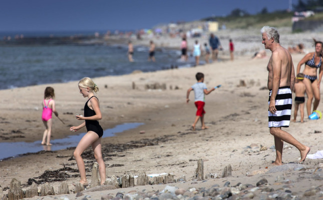 Bathers escape the heat at a Zealand beach in 2013. Photo: Johan Wessman/News Øresund.