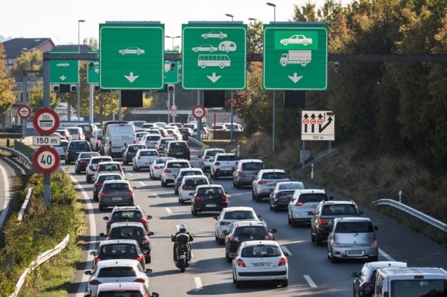 Cross-border workers commute by car but they can for now continue to work at home