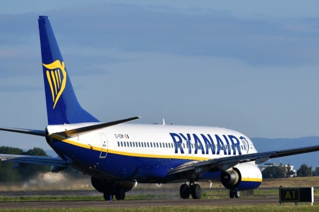 A Boeing 737 bearing the livery of Irish low-cost airline Ryanair taxies on the tarmac on its way to take off from Rome's Fiumicino airport. 