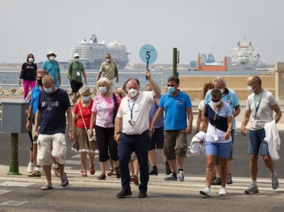 Spain posts record drop in summer unemployment as tourists return