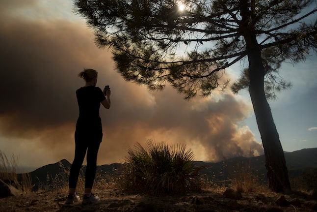 Rain helps fight against 'monster' wildfire in Spain