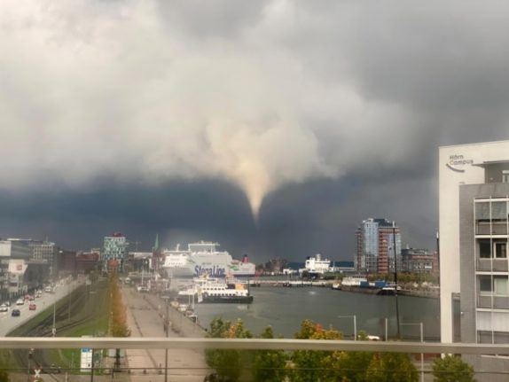 A tornado seen in the distance over Kiel on Wednesday.