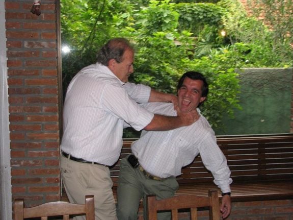 Funny picture of father-in-law strangling son-in-law
