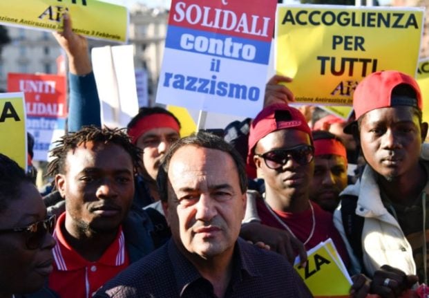 Domenico Lucano participates in a march against racism in Rome on November 10, 2018