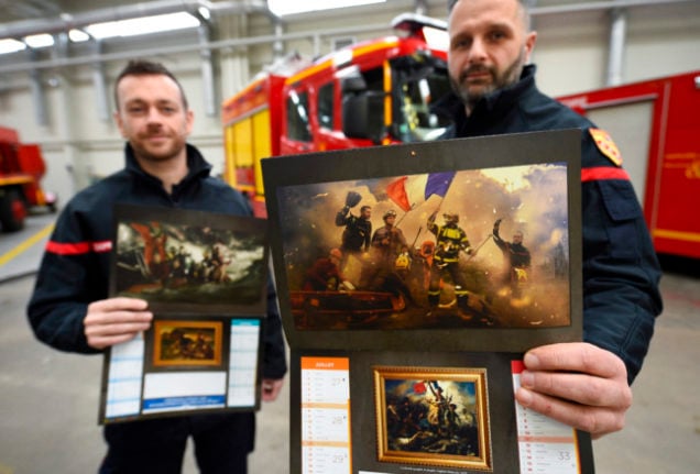 Members of Nancy's firefighters' association pose with their 2019 calendar. The photographs reproduced famous paintings like 