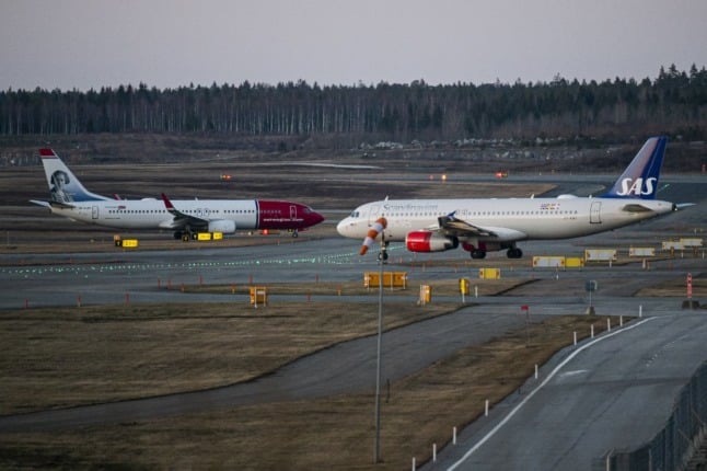SAS and Norwegian planes at Arlanda airport in Sweden. 