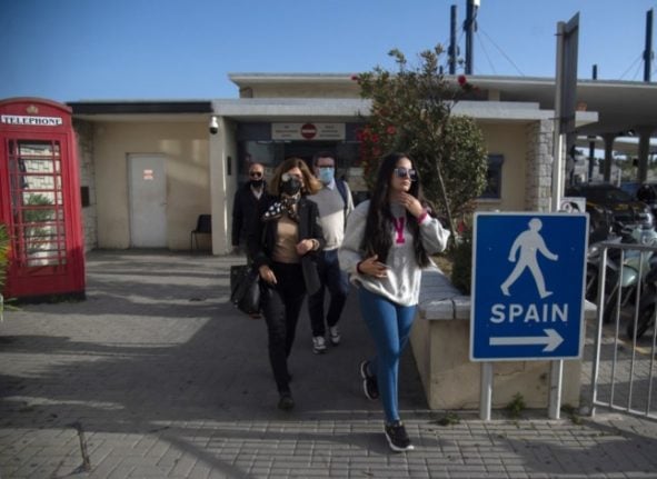 people cross border between gibraltar and spain