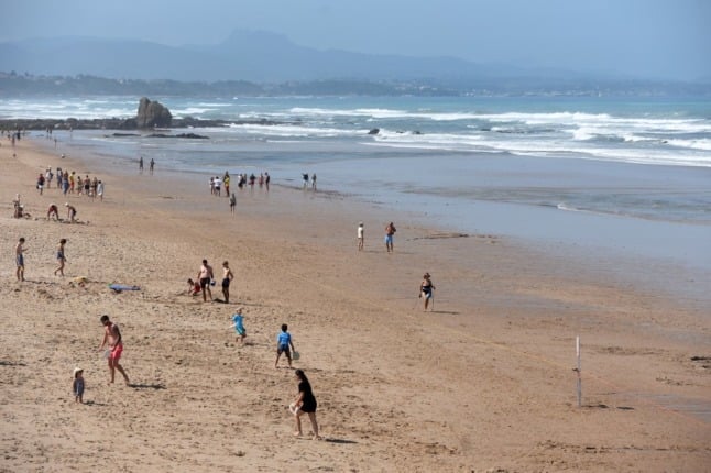 The beach at Biarritz with summer tourists 