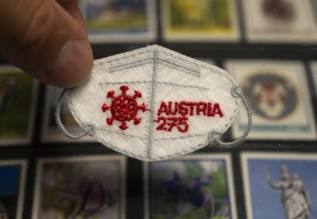 A special edition Austrian post stamp, in the shape of a face mask 