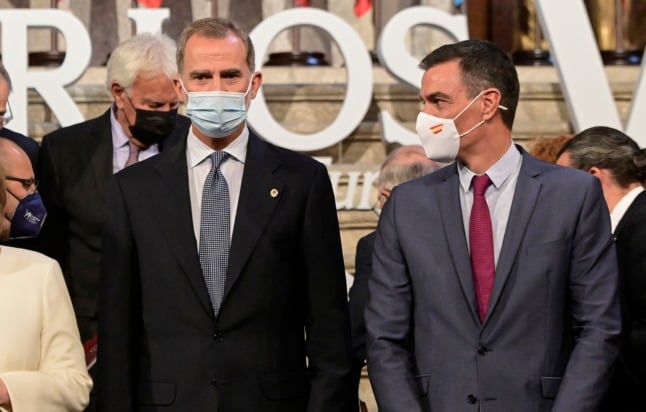 Spain's King Felipe VI and Spain's Prime Minister Pedro Sanchez pose for a group picture after the Carlos V European Award ceremony in October