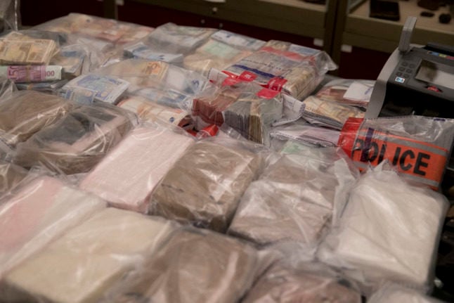 Drugs, bank notes and weapons seized by French police.